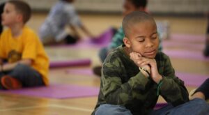 Student smiling during mindfulness session